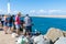 Fishermans cleaning fish in the small fishing village of Crowdy Head, famous for the breakwall used as a scenic walk and great