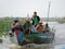 Fishermen in boat, Tonle Sap, Cambodia