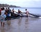 Fishermen bringing in the catch, Tobago.