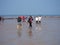 Fishermen in Brittany beach