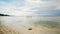 Fishermen carry a boat to the sea. Bohol Island. Philippines.