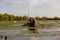 Fishermen checking nets at dawn in Danube Delta
