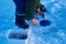 Fishermen engaged in ice fishing