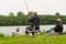 Fishermen and feeder hanging on a fishing line