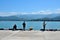 Fishermen with fishing rods at the Black Sea pier Batumi harbor Georgia