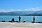 Fishermen with fishing rods at the Black Sea pier Batumi harbor Georgia