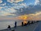 Fishermen fishing at sunset on the shores of the Sea of Marmara in Istanbul Turkey