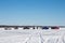 Fishermen Gathering on a Frozen Lake