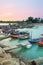 Fishermen harbor and Colorful twilight inevening over seascape a