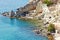 Fishermen houses with boat shelters in Goupa of Kimolos, Greece