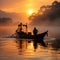 Fishermen looking for fish in the sea with a silhouette background in the afternoon