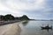 Fishermen maintenance and repair wooden fishing boat ship floating in sea at Prachuap Bay in Gulf of thai and waiting catch fish