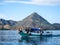 Fishermen old and young, cruising the shoreline, Flores, Indo, Asiaw/Oraisherman and young children, Flores, Indo, Asia