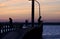 Fishermen On Pier At Twilight