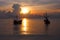 The fishermen preparing the boat to go out to fish