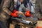 Fishermen in production with their hands pick and sort fish