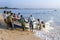 Fishermen pull their boat onto the beach at Arugam Bay after a nights fishing.