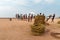 Fishermen pull their fishing net on Samudra beach in Kovalam