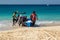 Fishermen pulling a boat ashore, Maio Island, Cape Verde