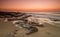 Fishermen on rocky beach