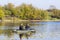 Fishermen rowing on an inflatable boat to catch predatory fish