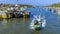 Fishermen rushing to land their catch in the lagoon in Negombo, Sri Lanka