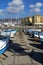 Fishermen`s boats at the entrance of the Marina di genova Airport.