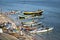 Fishermen`s with the boats that have brought their fish catch to the market at shore