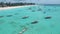 Fishermen`s boats near touristic beach in Zanzibar, aerial