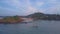 Fishermen sail on wooden boats along ocean upper