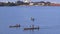 Fishermen sailing back to land with fish, Conakry