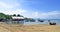 Fishermen shacks and boats at low tide at Mook island