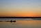 Fishermen Silhouette At Orange Sunset With Birds