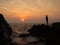 Fishermen silhouette at sunset