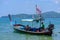 Fishermen sitting in his long tail boat