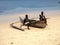 Fishermen sitting on a traditional boat, Nosi Be, Madagascar