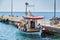 Fishermen are sorting ther catch at pier of Paleochora town on Crete island