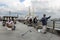 Fishermen with their rods adjacent to Golden Horn in Istanbul.