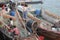 Fishermen to mend their nets in the boat