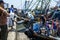 Fishermen unload their catch from a trawler at the busy harbour at Essaouira in Morocco.