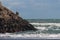 Fishermen on volcanic rocks