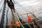 Fishermen in waterproof clothing on the deck of the fishing vessel