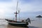 Fishermens boat at seacoast,Fishing boat on beach in morning. Tr