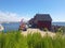 Fishermens wooden red cabins in harbor