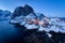 Fishermenâ€™s cabins rorbu in the Hamnoy village at twilight in winter season, Lofoten islands, Norway