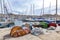 Fishernet at the pier in the old harbor of Marseille with lot of sailing boats