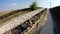 Fisheye of a conveyor belt transporting stones