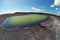 Fisheye view of Lago Verde volcanic lake, El Golfo. Lanzarote. C