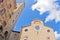 Fisheye view of San Gimignano towers and buidings on central square, Tuscany