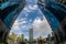 Fisheye view of tall buildings on waterfront at Dubai Marina